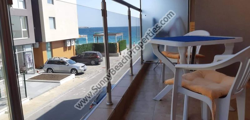 Beachfront Sea view furnished studio apartment for sale in residential building without maintenance in absolute tranquility 20m. from the beach in Ravda